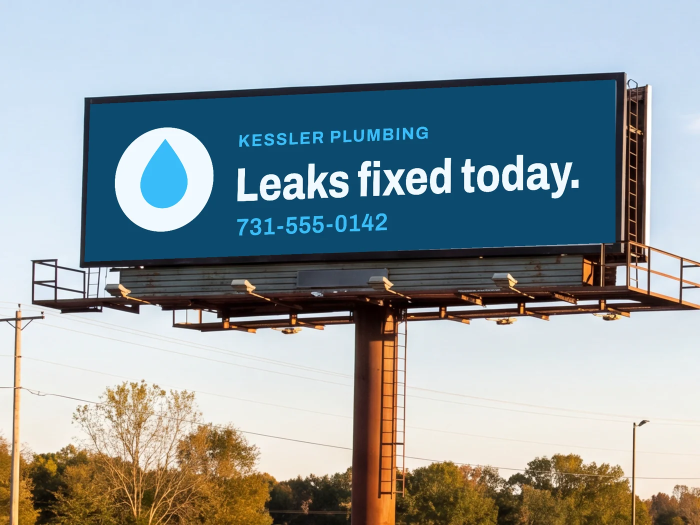 Billboard B-114 N showing the Kessler Plumbing design Studio made, mapped onto a photo of the face: Leaks fixed today, 731-555-0142